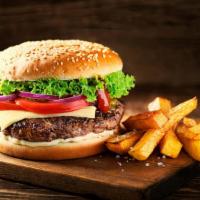 Beef Burger · Served with lettuce, tomatoes, and french fries.