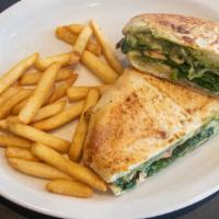 Pesto Panini · Grilled chicken, spinach tomatoes, provolone cheese, and pesto sauce. Served with french fri...