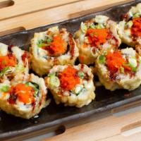 Firecracker Roll · Deep Fried Roll with shrimp tempura, cream cheese, avocado, jalapeno, crunch inside, top wit...