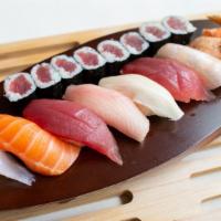Sushi Deluxe · 9 pcs Chef's selection assorted sushi, and 1 tuna roll.