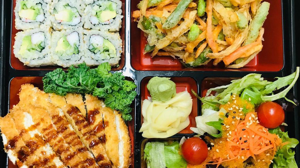 Pork Katsu Bento Box · Pork Katsu Bento Box, jasmine rice, california roll, veggie kakiage, side salad. Comes with miso soup.