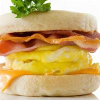 Turkey Bacon, Egg & Cheese Sandwich · Delicious Breakfast sandwich topped with 2 cooked eggs, crispy bacon, and melted cheese. Ser...