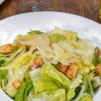 Caesar Salad · Romaine lettuce, croutons, shaved Parmesan, and Caesar dressing.