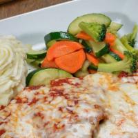 Chicken Parmigiana · Fresh tomato sauce and smothered with mozzarella cheese.
