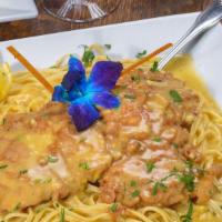 Veal Francese · Battered veal in white wine, lemon, and butter sauce.