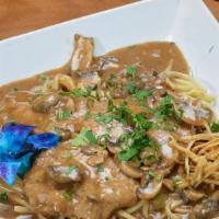 Veal Marsala · Tender veal in a classic marsala wine sauce with fresh mushrooms and shallots.