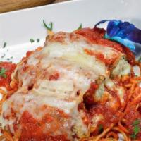 Eggplant Rollatini · Lightly battered eggplant stuffed with ricotta covered with sauce and melted mozzarella.