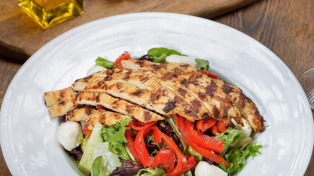 Italian Grilled Chicken Salad · Marinated grilled chicken, roasted peppers, fresh mozzarella, kalamata olives, and balsamic vinaigrette over mixed greens. Contains gluten-sensitive ingredients.