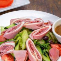 Antipasti Salad · Ham, salami, capicola and provolone cheese, mixed greens, and red wine vinaigrette. Contains...