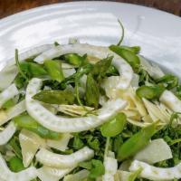 Arugula Salad · Arugula, shaved fennel, shaved Parmesan, and asparagus with a lemon vinaigrette dressing. Co...