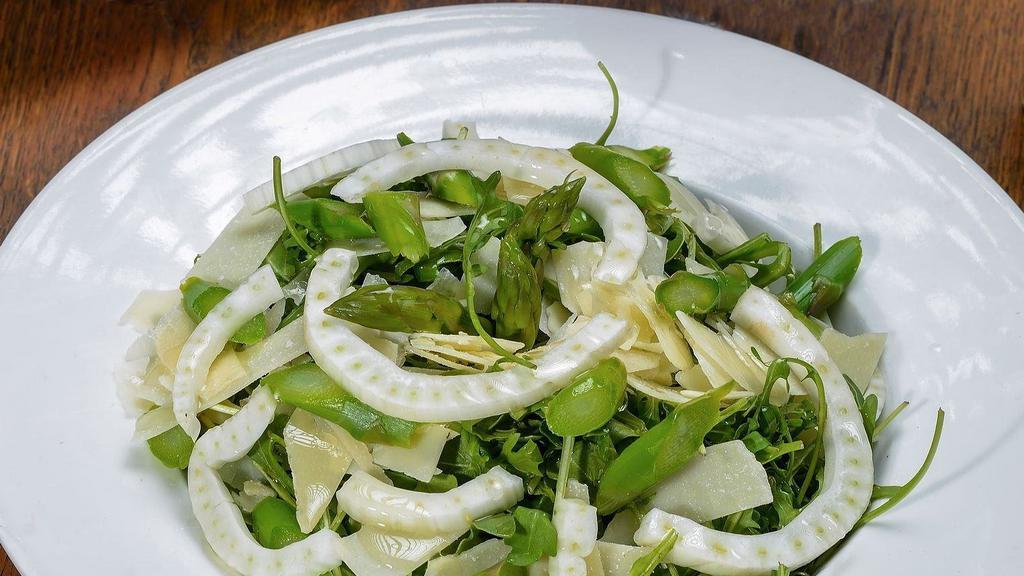 Arugula Salad · Arugula, shaved fennel, shaved Parmesan, and asparagus with a lemon vinaigrette dressing. Contains gluten-sensitive ingredients.