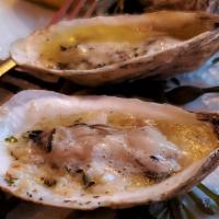 Grilled Oysters · Gluten-Free Option. 1/2 Dozen oysters grilled with an herb butter.