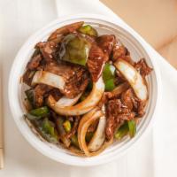 Pepper Steak · With steamed rice.