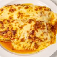 Baked Lasagna · Homemade meat lasagna with marinara sauce and melted mozzarella.