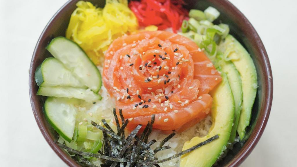 Salmon Don · Salmon sashimi over sushi rice, pickled radish, slice seaweed.
