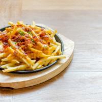 Disco Fries · Fresh made French fries topped with melted cheese and flavorful gravy.