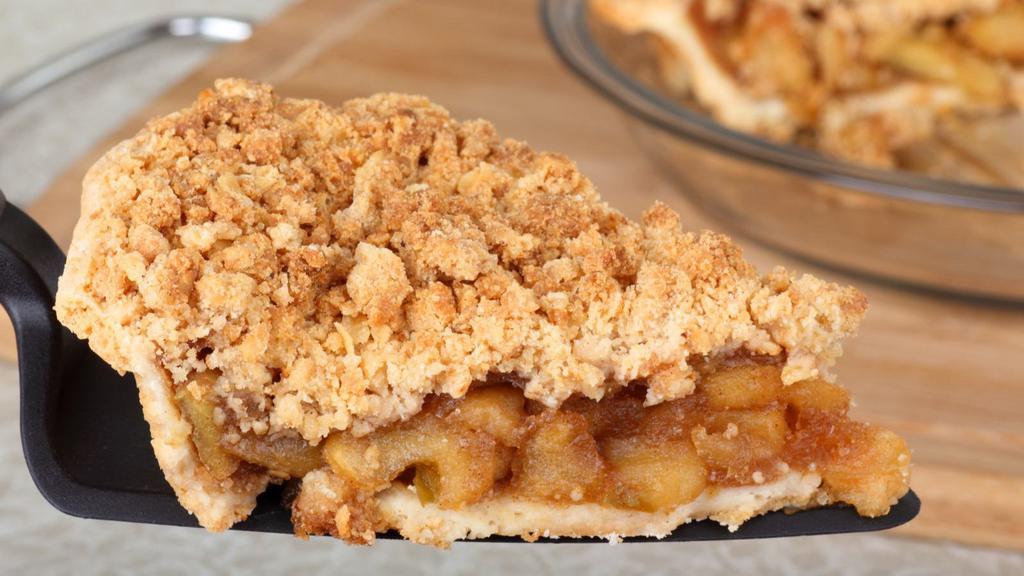 Apple Crumb Pie · Fresh baked apple pie expertly crafted with crisp locally grown apples in a buttery crust and topped with a sweet crumble.