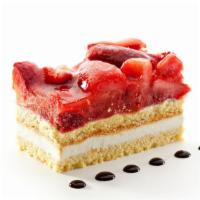 Fresh Strawberry Shortcake · Fresh baked cake with layers of sliced strawberries and cream.