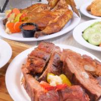 Family 1 (4-5 People) · Whole chicken, full rack pork ribs with 5 sides.