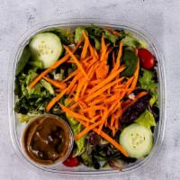 Tossed Salad · Romaine lettuce, mesculin greens, carrots, peppers, cherry tomatoes & our own homemade balsa...