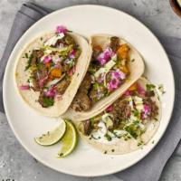 Carne Asada Taco · Create your Carne Asada taco with all-natural flank steak, your choice of Tributo toppings, ...