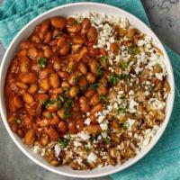 Cauliflower Rice And Beans · Cauliflower rice and house-made pozole beans.