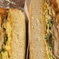 Torta · Mexican sandwich with Avocado, lettuce, tomato and jalapeno mayo with choice of breaded chic...