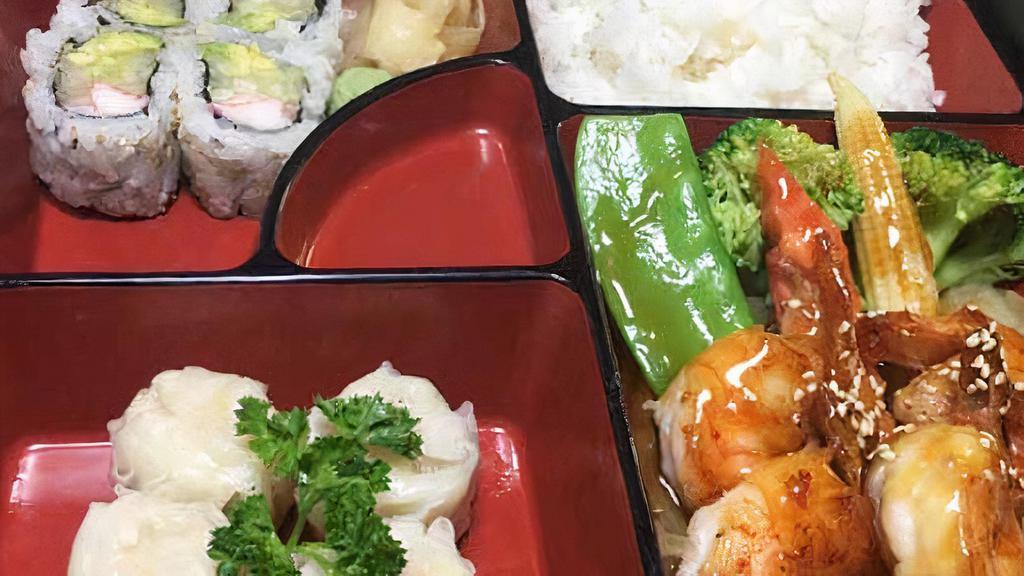Teriyaki Lunch Box · Served with miso soup or salad comes with California roll, shrimp shumai and white rice.