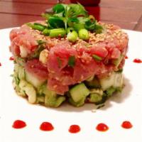 Spicy Tuna Tartar · Spicy. Chopped tuna, avocado and sesame with sesame dressing.