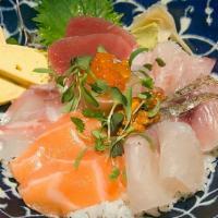 Chirashi · 14 pieces assorted sashimi over sushi rice.