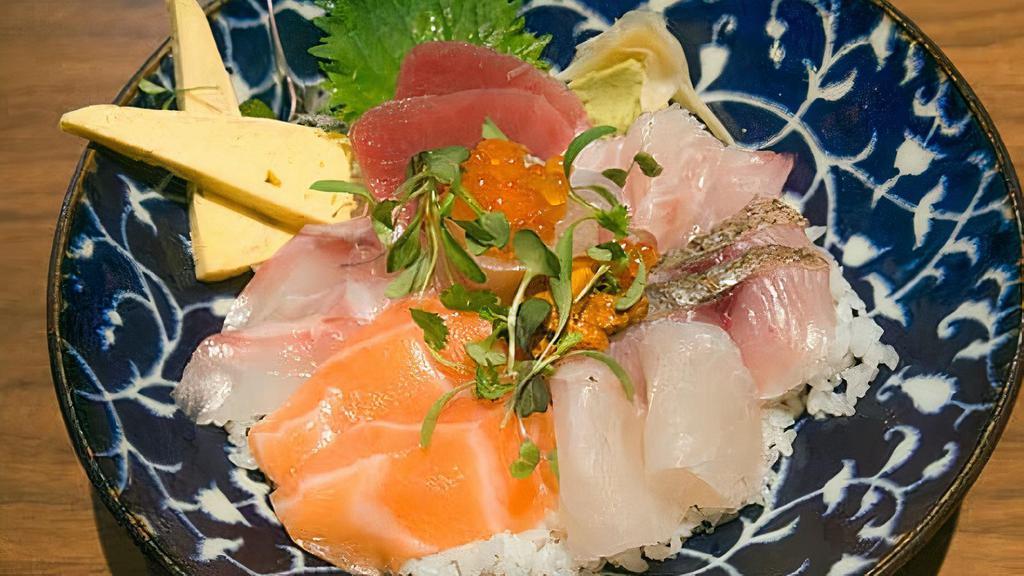 Chirashi · 14 pieces assorted sashimi over sushi rice.
