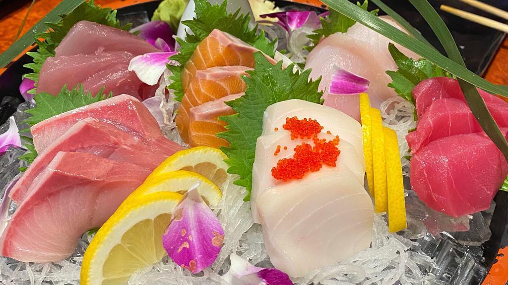 Sashimi Deluxe · 18 pieces assorted fish.