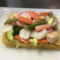 Seafood Pan Fried Noodles · Served with rice.