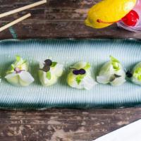 Edamame Dumplings (6) · 6 pieces with truffle miso broth. Our favorite.
