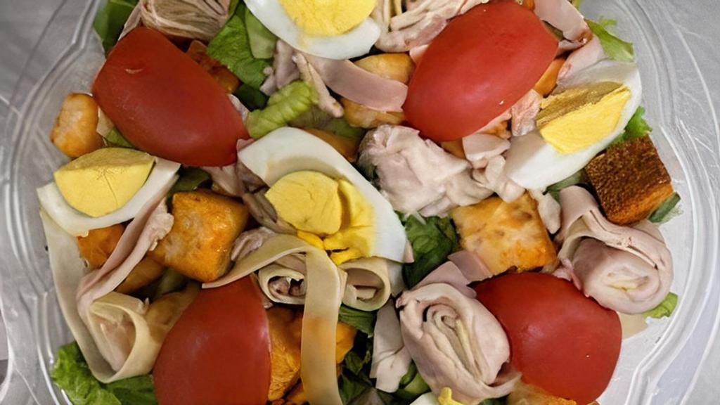 Chef Salad · Romaine with Turkey, Ham, Swiss, Tomato, Hard Boiled Egg & Croutons