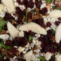 Piccolo Pear Salad · Field Greens with Pears, Dried Cranberries, Crumbled Bleu Cheese, Candied Walnuts