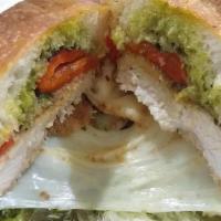 The Milano · Breaded chicken cutlet, roasted peppers, melted mozzarella, pesto sauce on ciabatta
