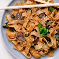 Pad See Ew · Savory and balanced with a touch of sour and bold chargrilled flavor. Wok-fried flat noodles...