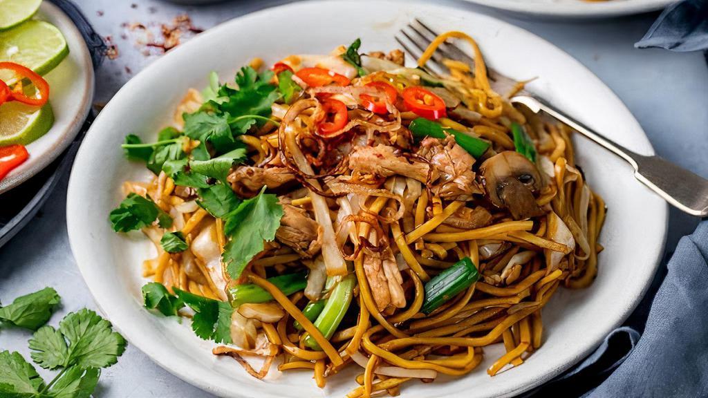 Indonesian Mee Goreng · Spicy, savory, sweet, and tangy. Egg noodles made with eggs, bean sprouts, tomato, and potato, soy sauce, and fresh lime.