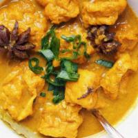 Malaysian Curry · Yellow curry, mild in spice. Served with your choice of protein, tomato, potato. Vegan and g...