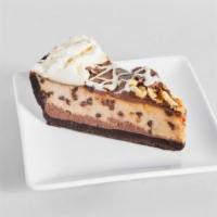 Peanut Butter Pie  · Dark chocolate and PB mousse filled pie.