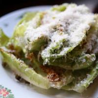Romana · romaine lettuce, anchovy vinaigrette, parmigiano, garlic breadcrumbs