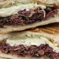 Ricky Special Sandwich · FRESH SLICED LEAN PASTRAMI W/ MELTED FRESH MOZZ TOPPED WITH PICKLES AND SRIRACHA SAUCE ON A ...