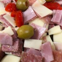 Antipasto Salad · HAM, SALAMI, PROVOLONE W/ROAST PEPPERS & OLIVES OVER A BED OF FRESH TOSSED SALAD