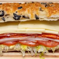 Italian Sub Sandwich · Prosciutto, salami, pepperoni, provolone cheese, lettuce, tomato, onion, olive oil, and vine...