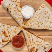 Chicken Quesadilla · Peppers, onion, mozzarella and Cheddar cheese. Served with salsa and sour cream.
