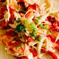 Lobster Roll Taco · 3oz. Butter Sauteed Lobster Meat, Green Cabbage, Old Bay Aioli, Scallions, Flour Tortilla