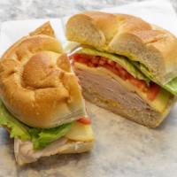 Harlem H.C. · Mesquite smoked turkey, smoked gouda cheese with lettuce, tomato and honey mustard.