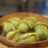 Steamed House Vegetable Dumplings · 8 pieces.