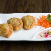 3 Pieces Curry Puff · Deep fried puff pastry stuffed with ground chicken, sweet potato, onion and curry powder.